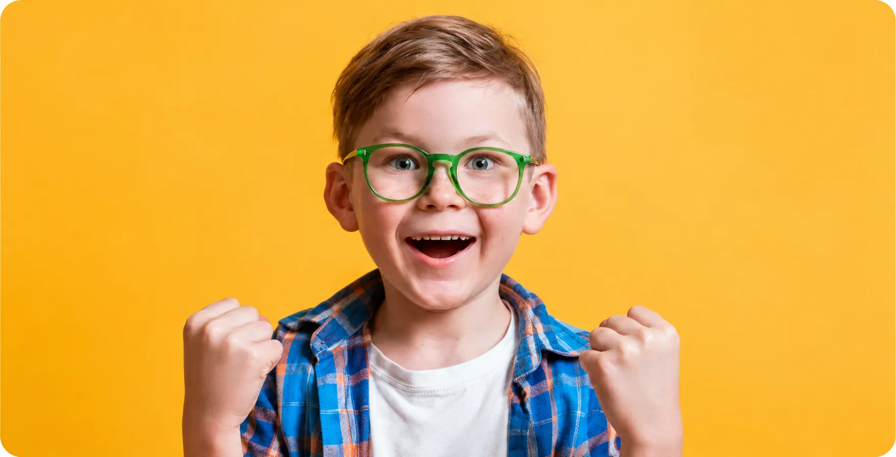 Child celebrating their cavity-free smile
