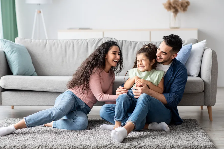 Family relaxing together at home