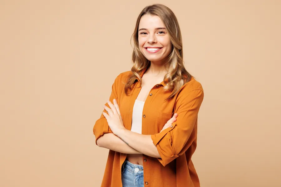 Smiling person representing orthodontic care