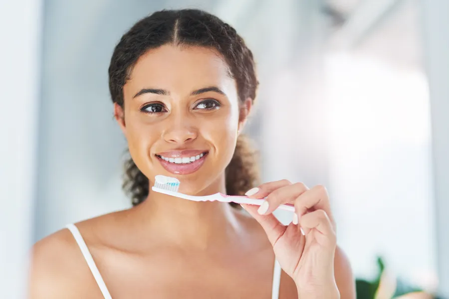 Demonstrating proper brushing technique